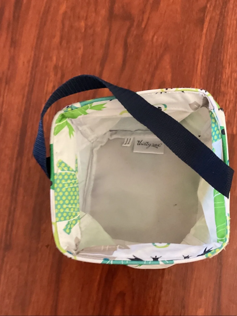thirty-one Green & Navy Frog Print Organizer Pouch approximately 6” x 6”.